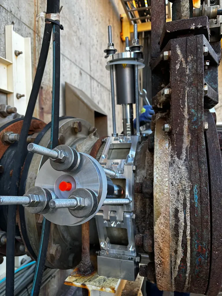 Ultrasonic transducers installed on a pipe.